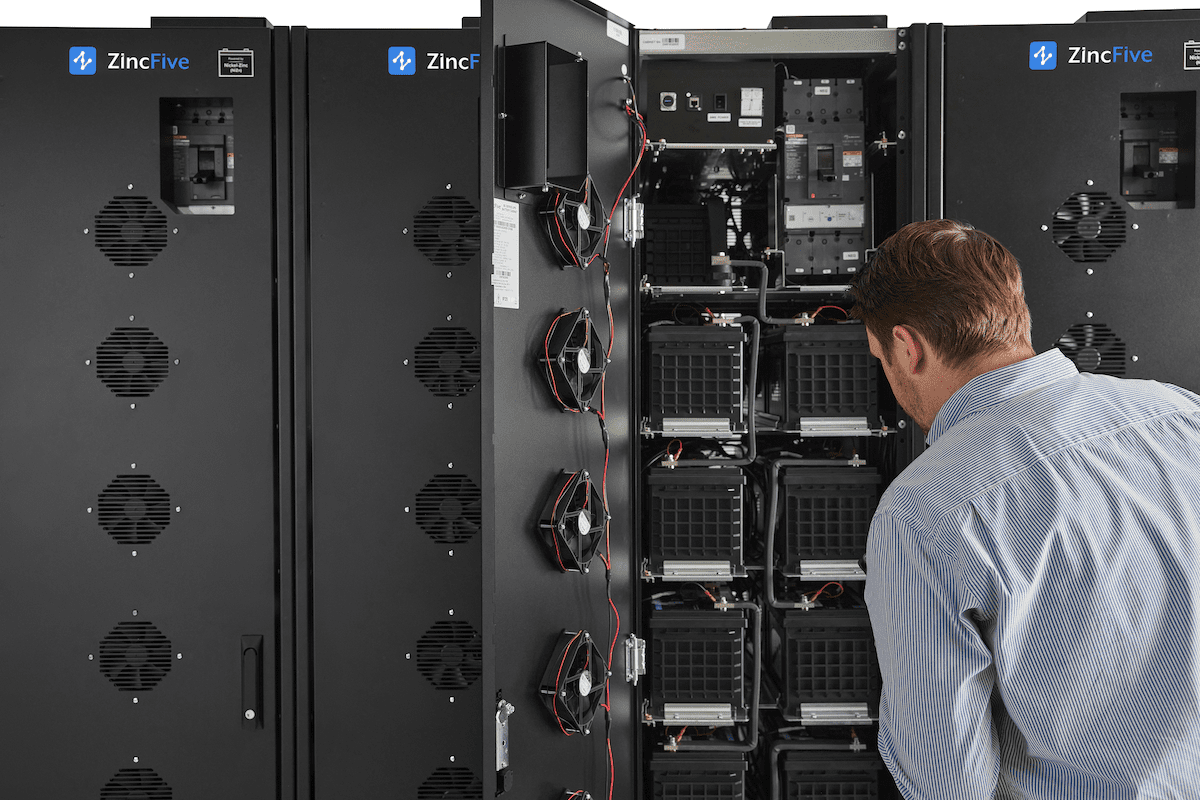 ZincFive BC 2 UPS Battery Cabinet with engineer reviewing the system